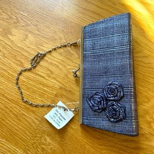 Metallic blue clutch